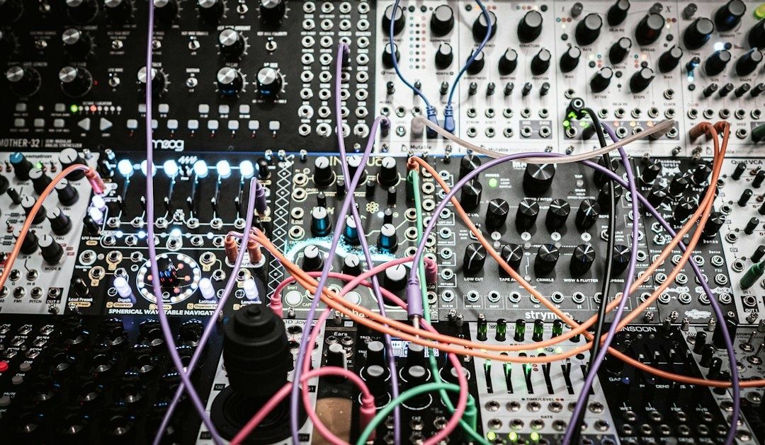 Dense modular synthesizer patch with colorful cables and glowing controls